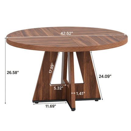Ronde eettafel 120 cm met walnoot houtlook, rond houten tafelblad en modern geometrisch onderstel, vooraanzicht op witte achtergrond.