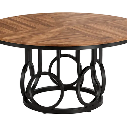 Ronde eettafel 120 cm met bruin houten tafelblad en zwart metalen onderstel met decoratieve ringen, vintage eetkamertafel voor 4 tot 6 personen op witte achtergrond.