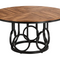 Ronde eettafel 120 cm met bruin houten tafelblad en zwart metalen onderstel met decoratieve ringen, vintage eetkamertafel voor 4 tot 6 personen op witte achtergrond.