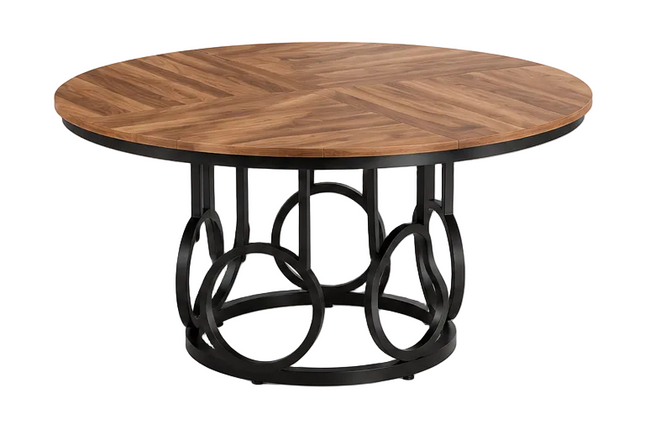 Ronde eettafel 120 cm met bruin houten tafelblad en zwart metalen onderstel met decoratieve ringen, vintage eetkamertafel voor 4 tot 6 personen op witte achtergrond.