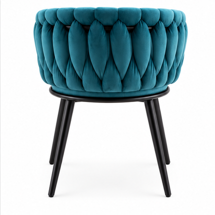 Turquoise fluwelen eetkamerstoel met luxe geweven rugleuning, armleuningen en stevige zwarte metalen poten.