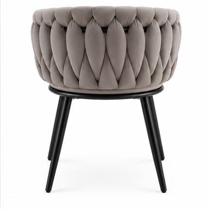 Twee luxe grijze fluwelen eetkamerstoelen met armleuningen, geweven rugleuning en zwart metalen onderstel.
