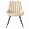 Moderne beige gestoffeerde eetkamerstoel met verticale stiknaden, comfortabele rugleuning en zwarte metalen poten, vooraanzicht op witte achtergrond.